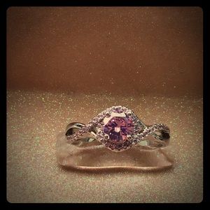 One ladies pink simulated gemstone ring.